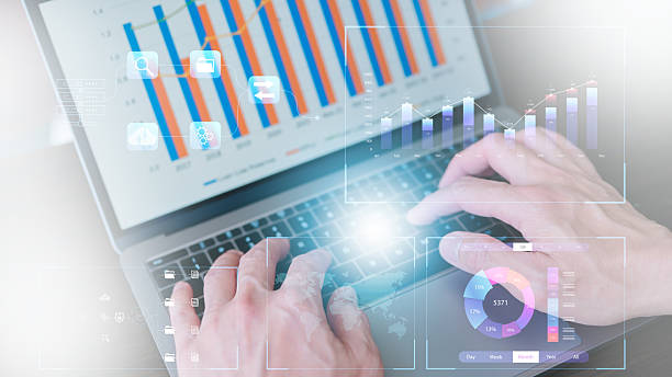 istock businessman using computer laptop working with data charts investment financial concept finance data analytics graph.Financial management technology.Advisor using KPI Dashboard on virtual screen 2207586804