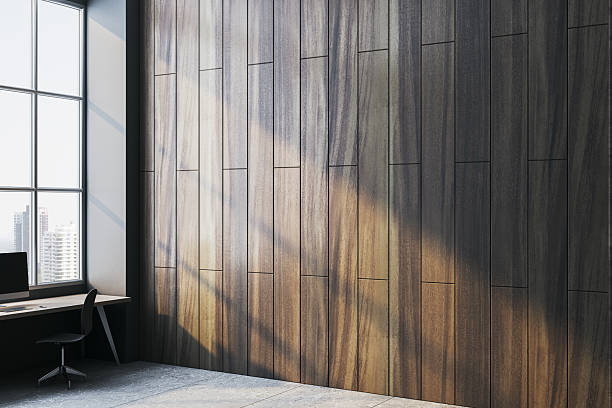 istock Modern office interior with wooden wall and sunlight reflections. 3D Rendering 2207592246