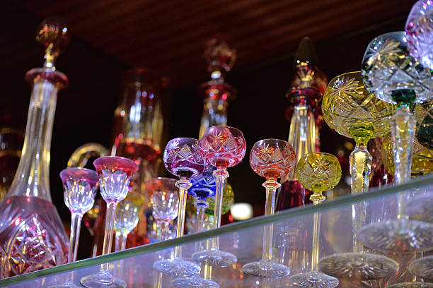 istock Coloured cut crystal glasses and decanters 2207595956