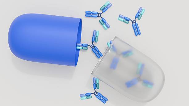istock A 3d rendering of drug capsule and antibody molecules 2207596352