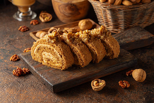 istock Walnut and buttercream roll: a traditional Oriental pastry. 2207603668