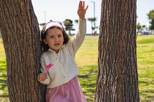 Child with magic wand.
