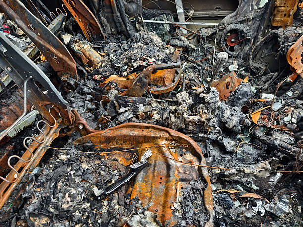 istock Charred remnants of a vehicle interior left behind after a devastating fire incident 2207609244