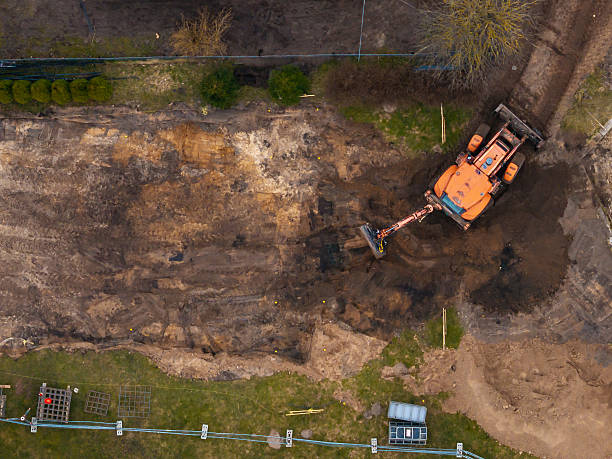 istock Aerial View of Excavator at Construction Site with Soil Excavation 2207612272