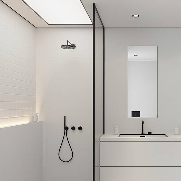 istock Minimalist White Bathroom with Sleek Black Accents 2207612983
