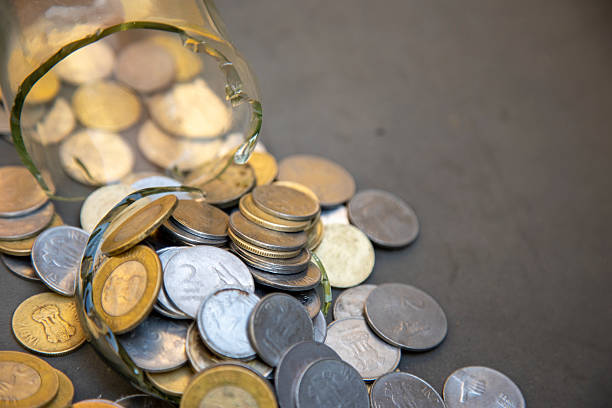 Piggy bank full of one and two euro coins