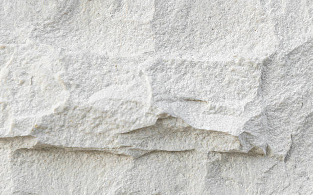 istock [4k] Close-up of White Crushed Stone Texture 2207614381
