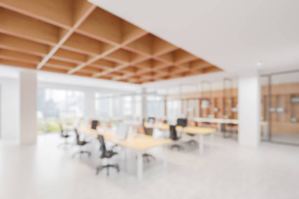 istock Modern office interior with wooden ceiling and blurred background. 3D Rendering 2207614673
