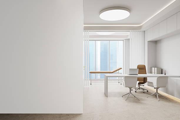 istock Modern interior with empty white wall and office furniture in bright medical space. 3D Rendering 2207614717