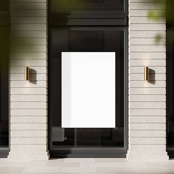 istock Blank poster mockup on glass window of modern building exterior. 3D Rendering 2207615401