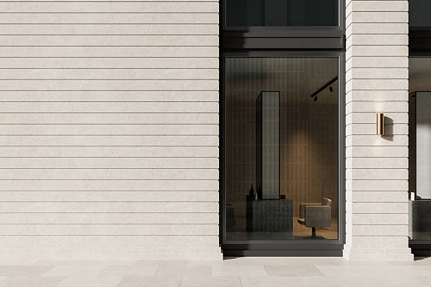istock Modern outdoor facade with blank wall for advertising mockup. 3D Rendering 2207615559