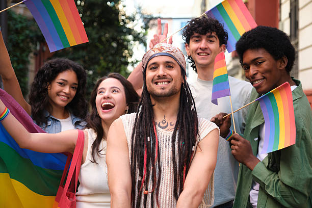 istock Group of friends having fun at LGBTQ pride parade 2207618657