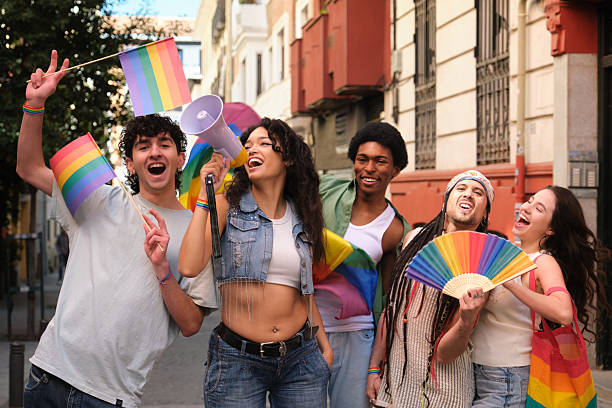 istock Young activists protesting for LGBT rights in the city 2207619102