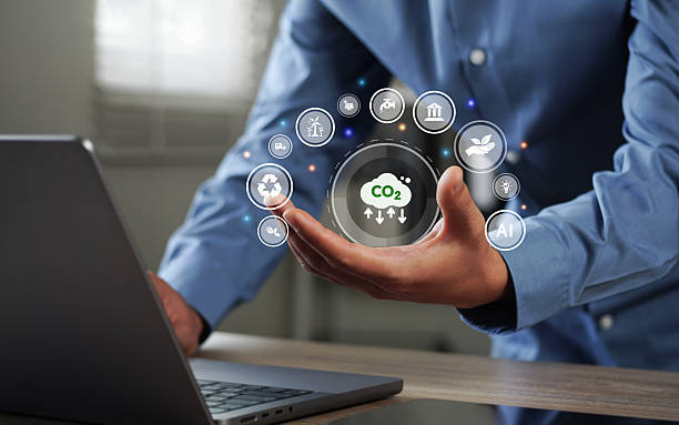 istock CO2 concept, sustainable development goals, World Environment Day, businessman using computer to analyze carbon footprint report graph Co2 2207619696