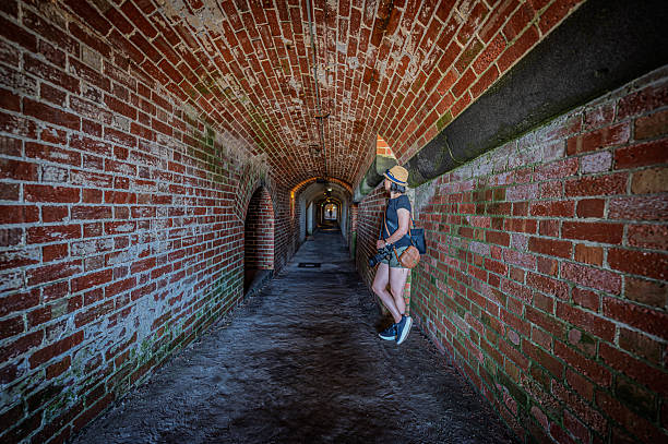 Little boy running through the tunnel