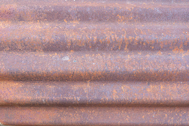 istock Rusty Corrugated Metal Sheet Texture Background Grunge Industrial Oxidized Iron Surface Detail 2207622680