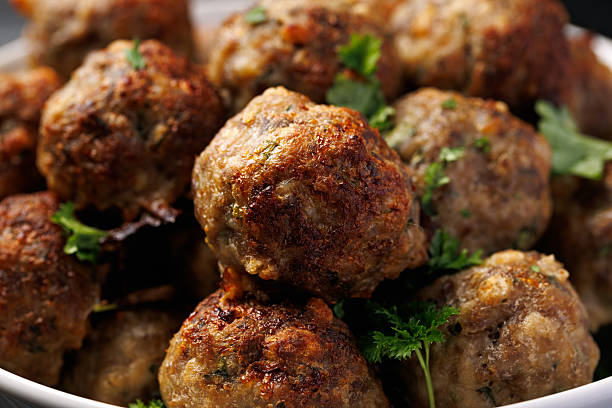 istock Homemade beef and pork meatballs on baking paper 2207622682