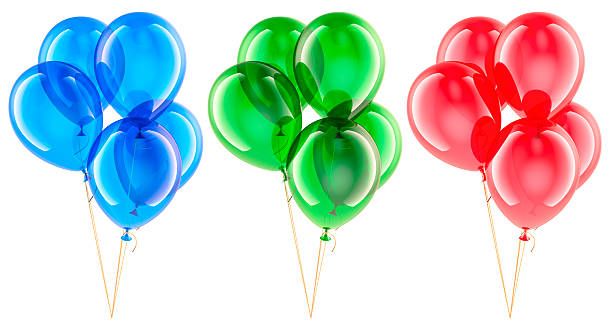With CLIPPING PATH.Row of colorful balloons with ribbon isolated on a white background with clipping path.Studio shot.