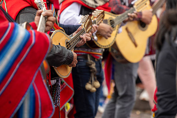 playing guitar at festival
