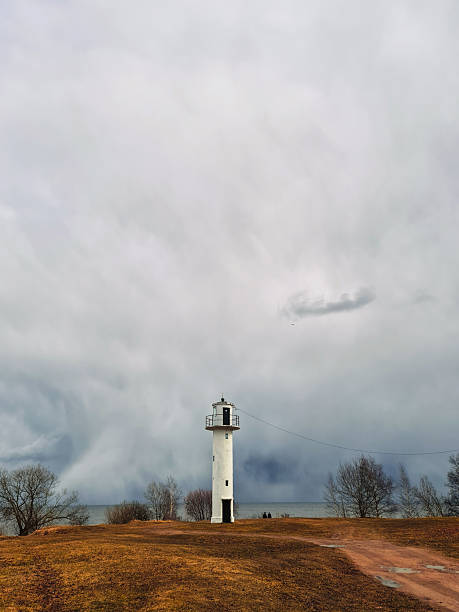 istock White lighthouse near the lake 2207631053