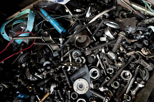 A disorganized assortment of metal tools and hardware components.