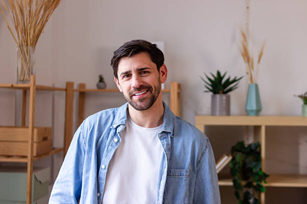 istock Portrait of smiling freelancer working from home office 2207637164