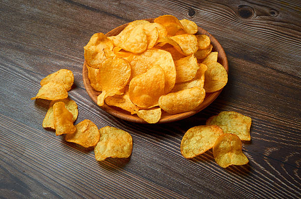istock A plate of potato chips is on the table. 2207642840