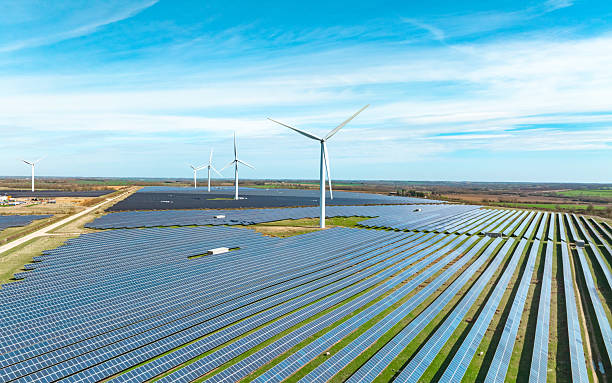Wind turbines and solar panels in England