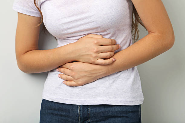 istock Woman having stomach ache 2207653417