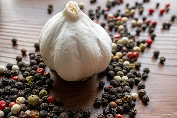 istock garlic and black pepper grains 2207654283