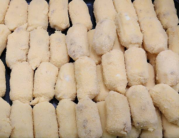 istock Croquettes prepared to be cooked in the pan 2207655664