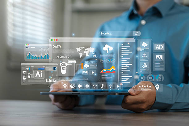 istock Businessman using AI technology on the screen of work to analyze data Chatbot chat with AI using AI smart robot technology. Increase work efficiency with AI solutions Chatbot helps solve work problems. 2207658785