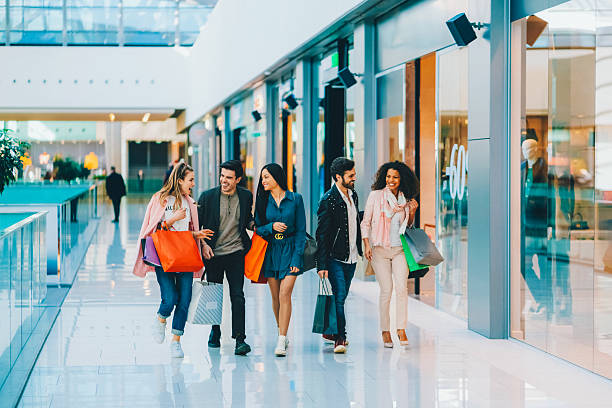 istock Group of friends shopping together 2207661017