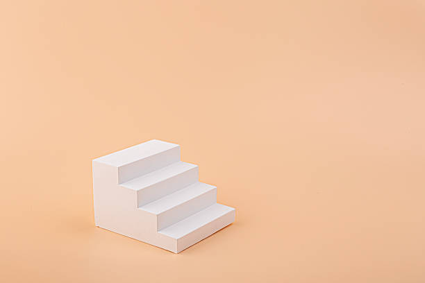 istock Empty modern white geometric stair steps, product display. Simple staircase for cosmetic podium. 2207661542