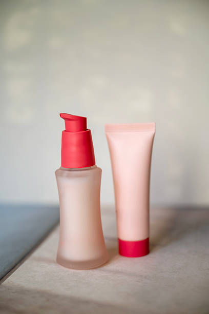 istock Anti aging face serum and cream on shadows background 2207665245