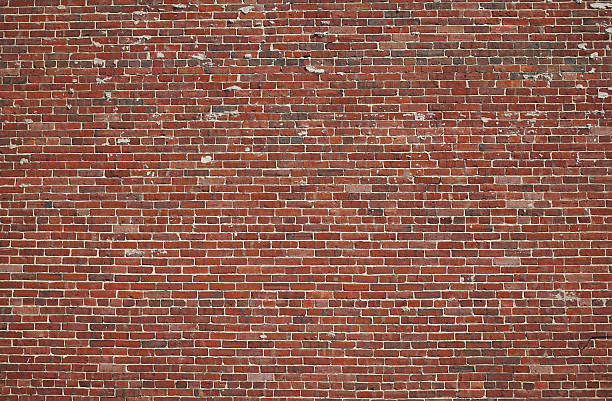 istock facade view of old brick wall background 2207665349