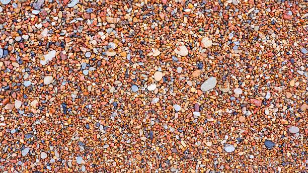 istock Pebble beach. Summer beach background. Ecology. 2207666153