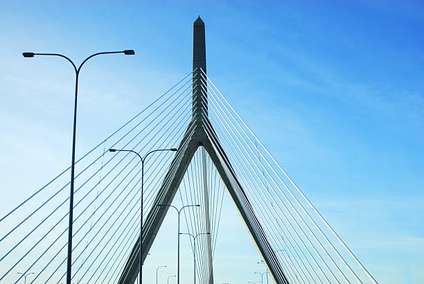 low angle view of the cable bridge against blue sky