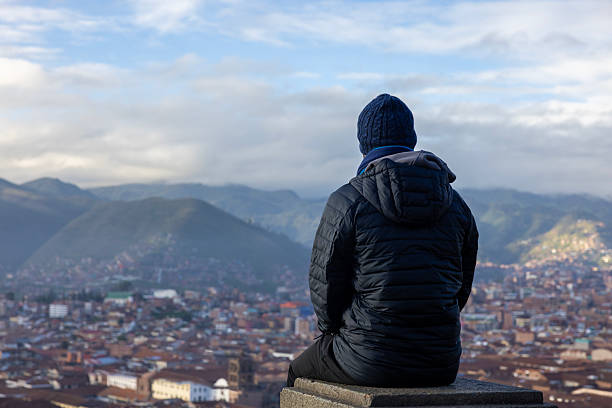 Man looking at the view of Cusco city