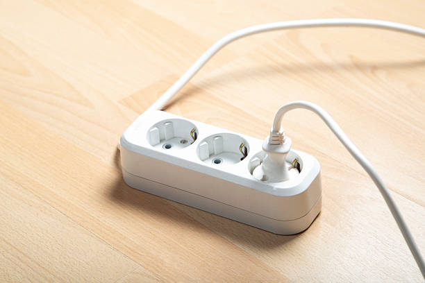 istock Tee extension cable in the apartment. 2207669418