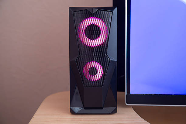 istock Computer speakers on the table next to the monitor. 2207669649