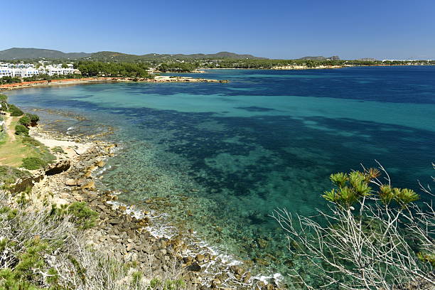 The tourism resort beach and beautiful bays of the area.