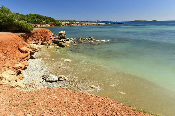 The tourism resort beach and beautiful bays of the area.