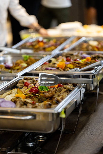 istock Catering display with various dishes during a vibrant social event in an indoor space 2207673144