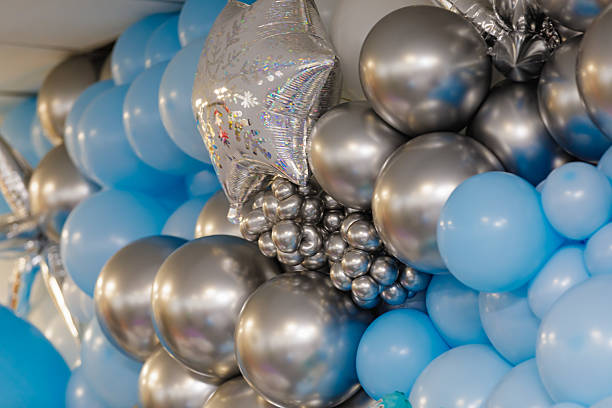 istock Silver and blue balloons creating a festive backdrop for celebrating 2207674258