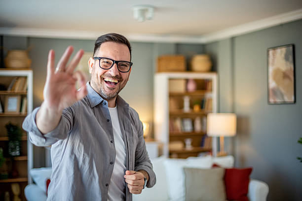 istock Happy man showing OK sign 2207681313