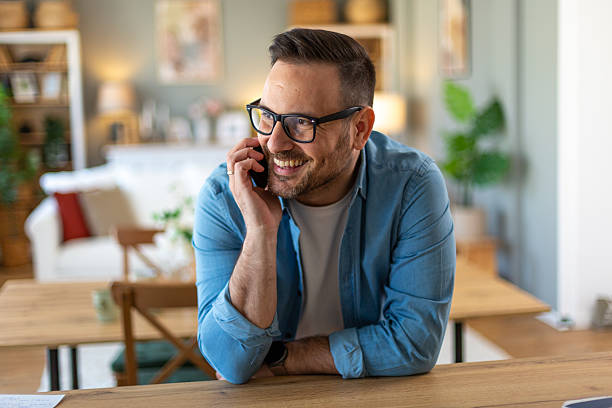 istock Happy man on the phone 2207683998