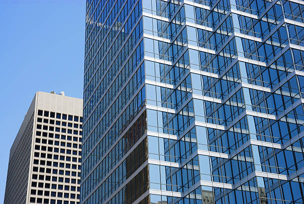 istock close up on modern office building skyscraper blue glass wall 2207684252