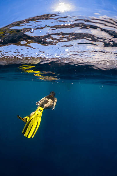 istock Beautiful woman diving underwater 2207684985