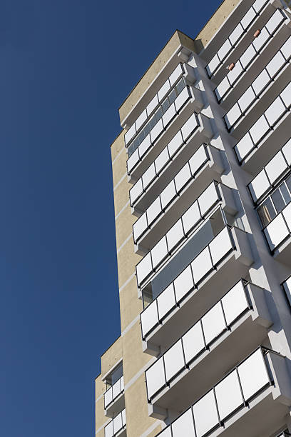 istock Modern Apartment Building with White Balconies 2207685599